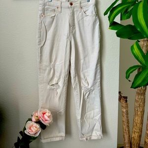 Cream colored ripped jeans
